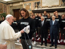Pope Francis meets a delegation from the Pro Recco Waterpolo 1913 Team at the Vatican, April 22, 2021.